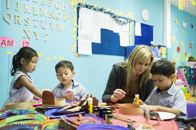 teachers and children in a preschool class