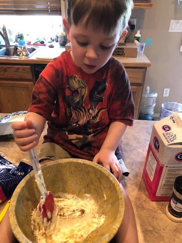 child mixing desert