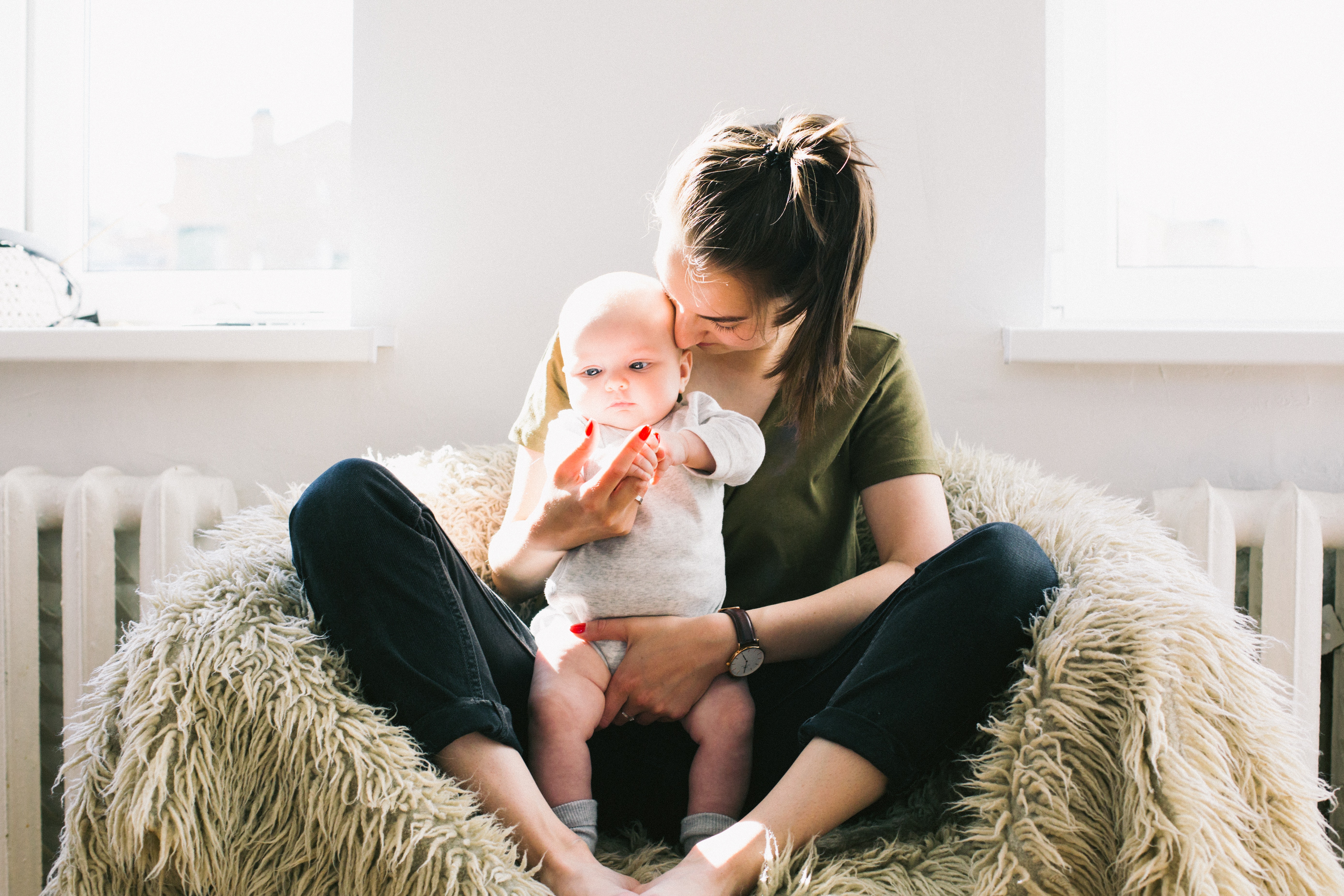 woman holding baby